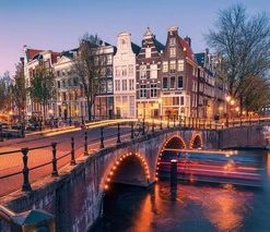 Ravensburger Panorama Puzzel Avond In Amsterdam - Legpuzzel - 1000 Stukjes -Exporteren puzzels winkel 550x213 2