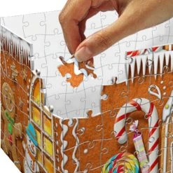 Ravensburger Kerst Gingerbread House Night Edition - 3D Puzzel Gebouw - 216 Stukjes -Exporteren puzzels winkel 550x576 1